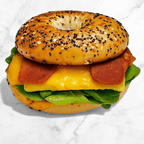 Best Bacon & Eggs Sandwich 100% Plant Base (egg, cheese, Cali aioli, spinach, bagel) in Culver City, CA